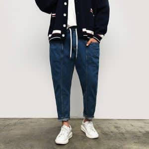 ג'ינס בגזרת באגי רחבה תפרים בחזית גומי במותן 946